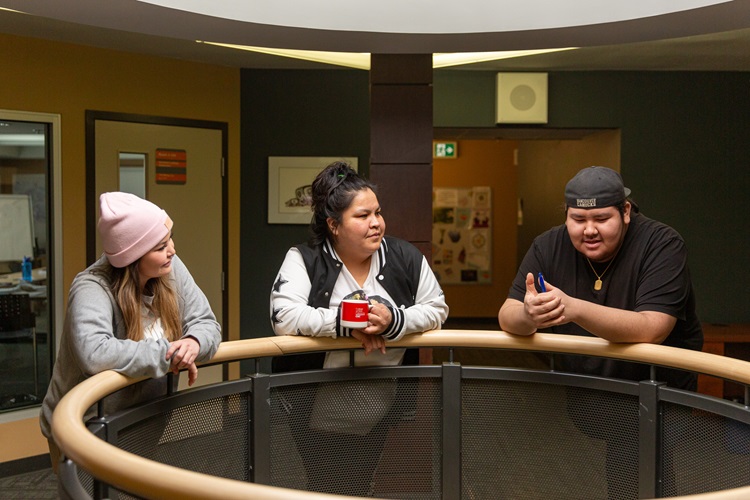 3 Students conversing