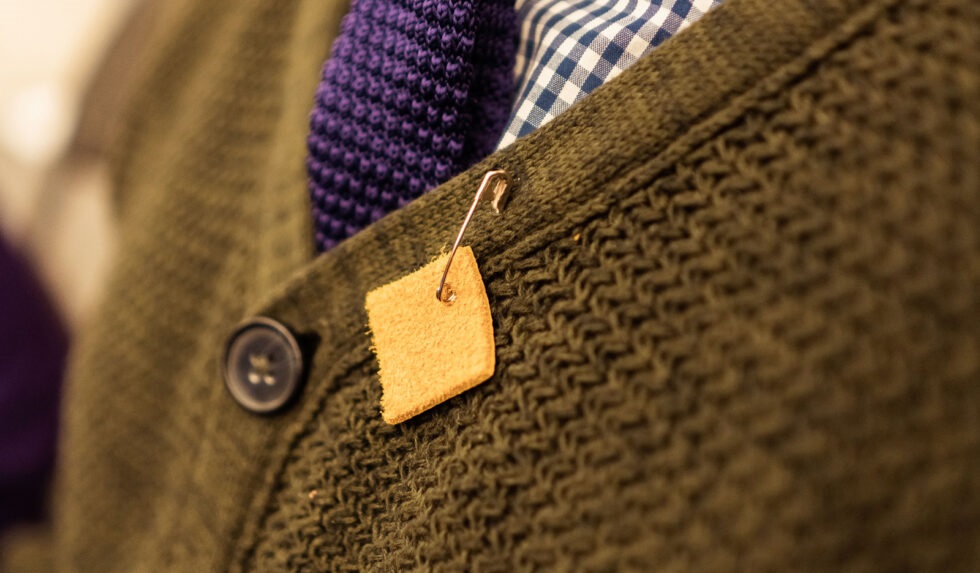 Moose Hide Pin on sweater