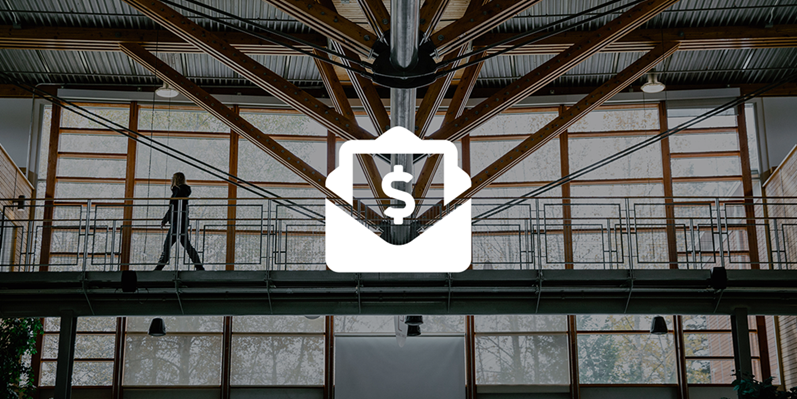 An icon of money in an envelope over an image of the Quesnel campus atrium catwalks