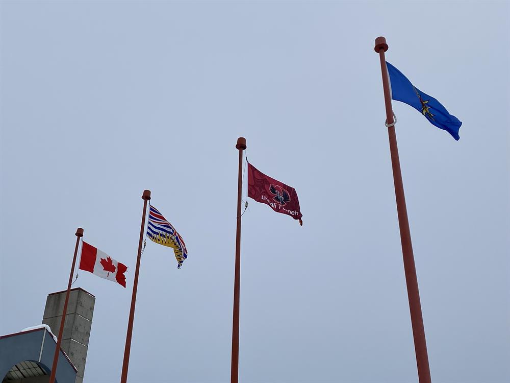 CNC Flags Flying at Full Mast