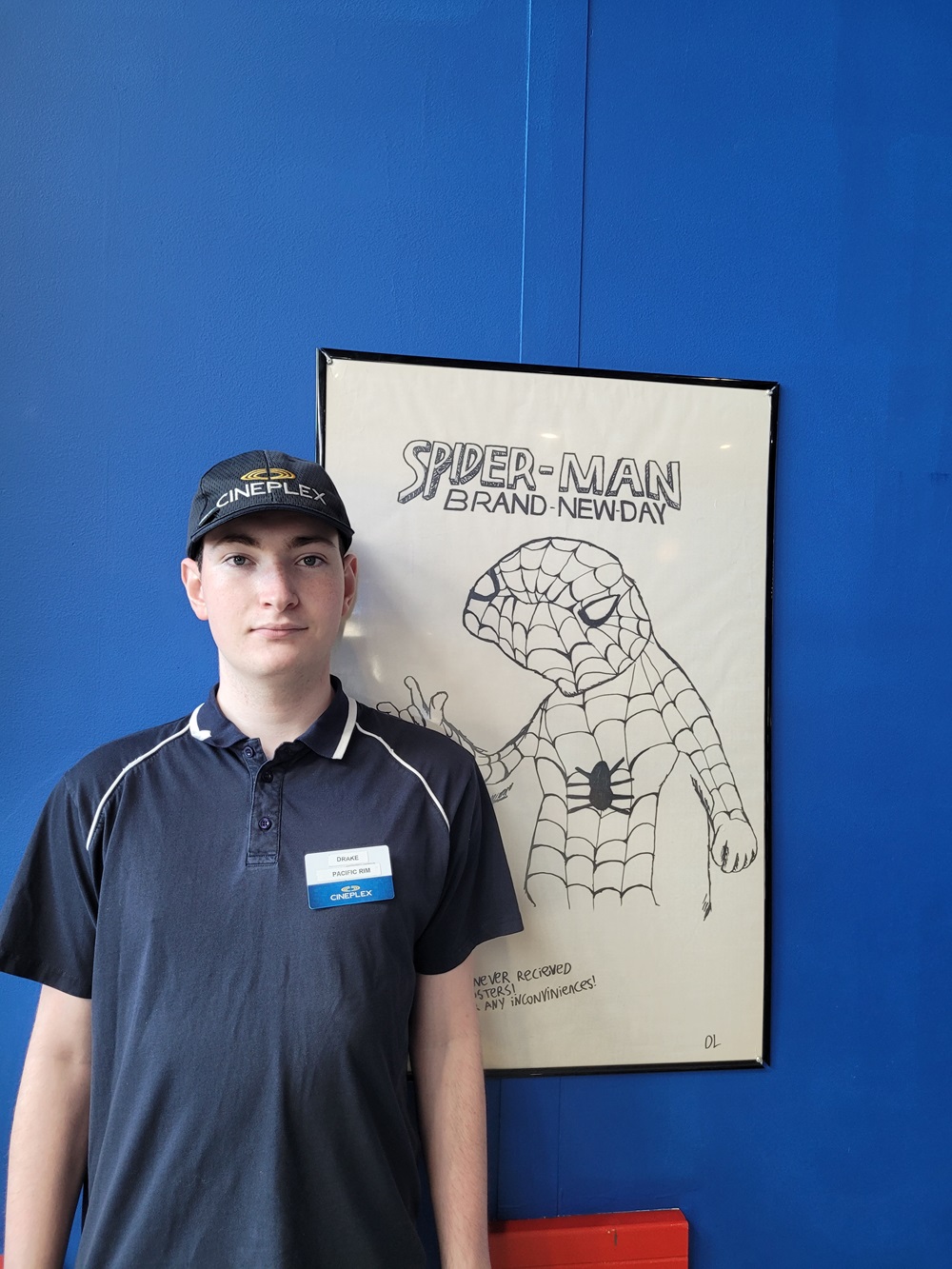 Drake Landon with his Spiderman drawing